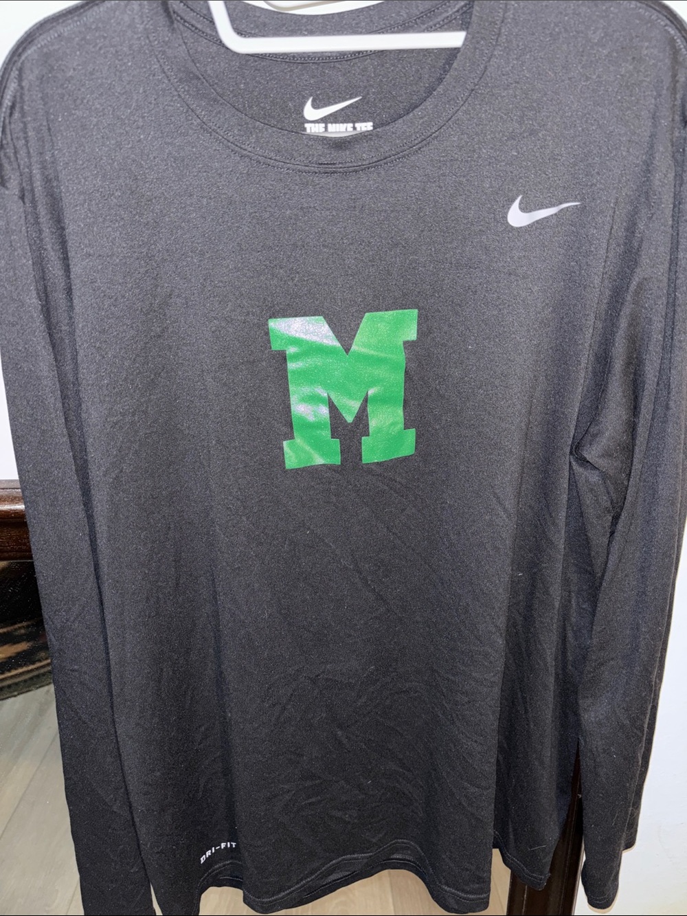 Nike Black Long-Sleeve Dri-FIT Shirt with Green 'M' Graphic